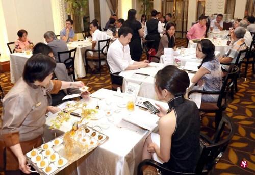 中國僑網“中國美食之旅”晚宴是第五屆亞洲食尊美食盛會的開幕活動。(新加坡《聯合早報》/周國威 攝)